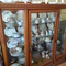 1910 china cabinet with handpainted china