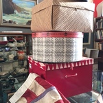 hats boxes and flag