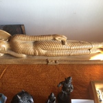 reclining wooden scuplture