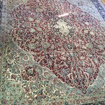 beautiful hand tied, signed rug