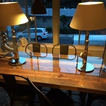 reclaimed wood table & Philippe Starck lamps